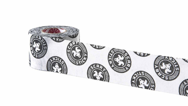 White and black Scary Sticky Goat Tape roll partially unrolled