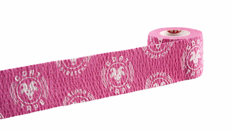 Pink and white Super Stretchy Goat Tape roll partially unrolled