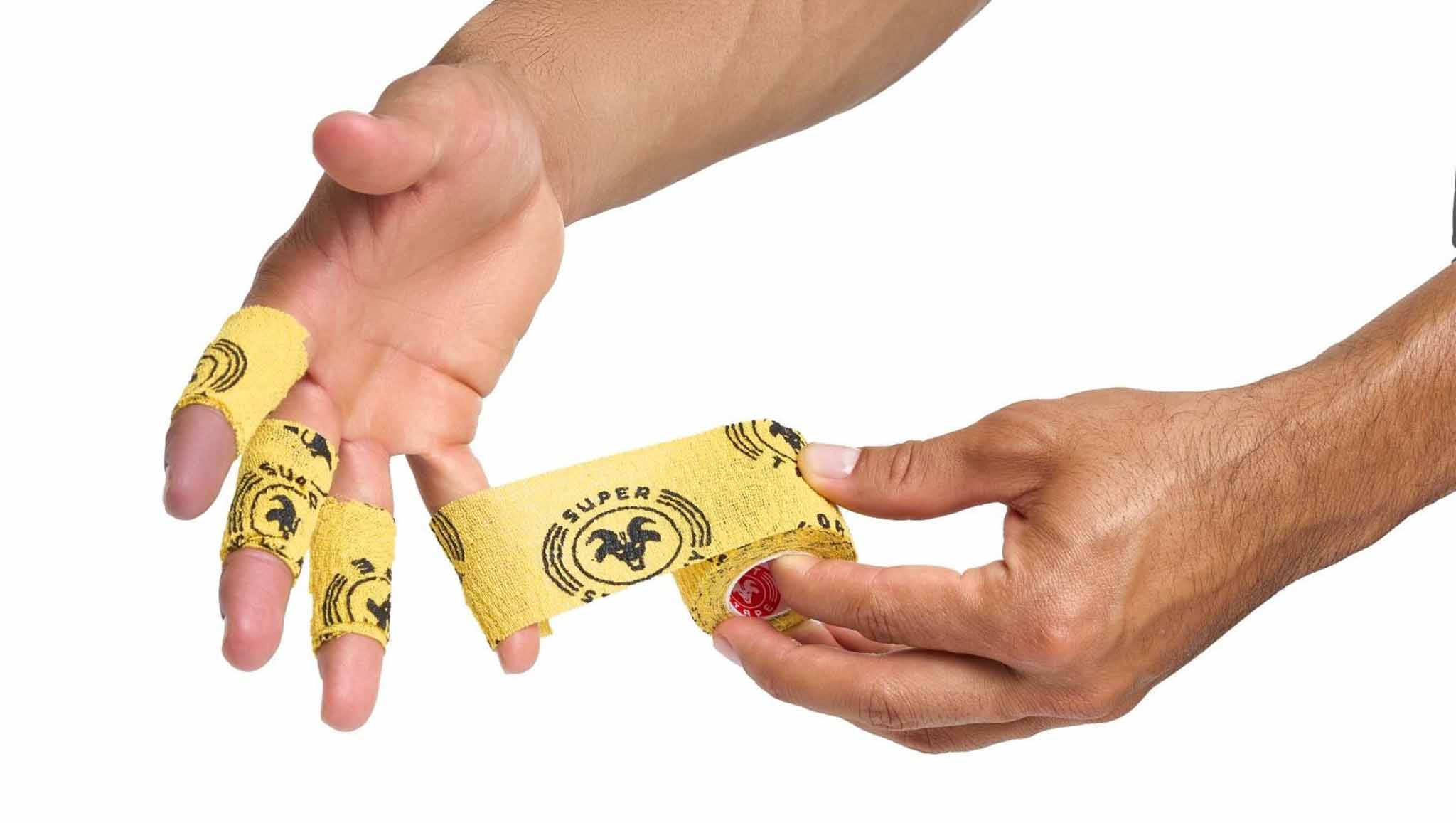 Yellow Super Stretchy Goat Tape applied on fingers