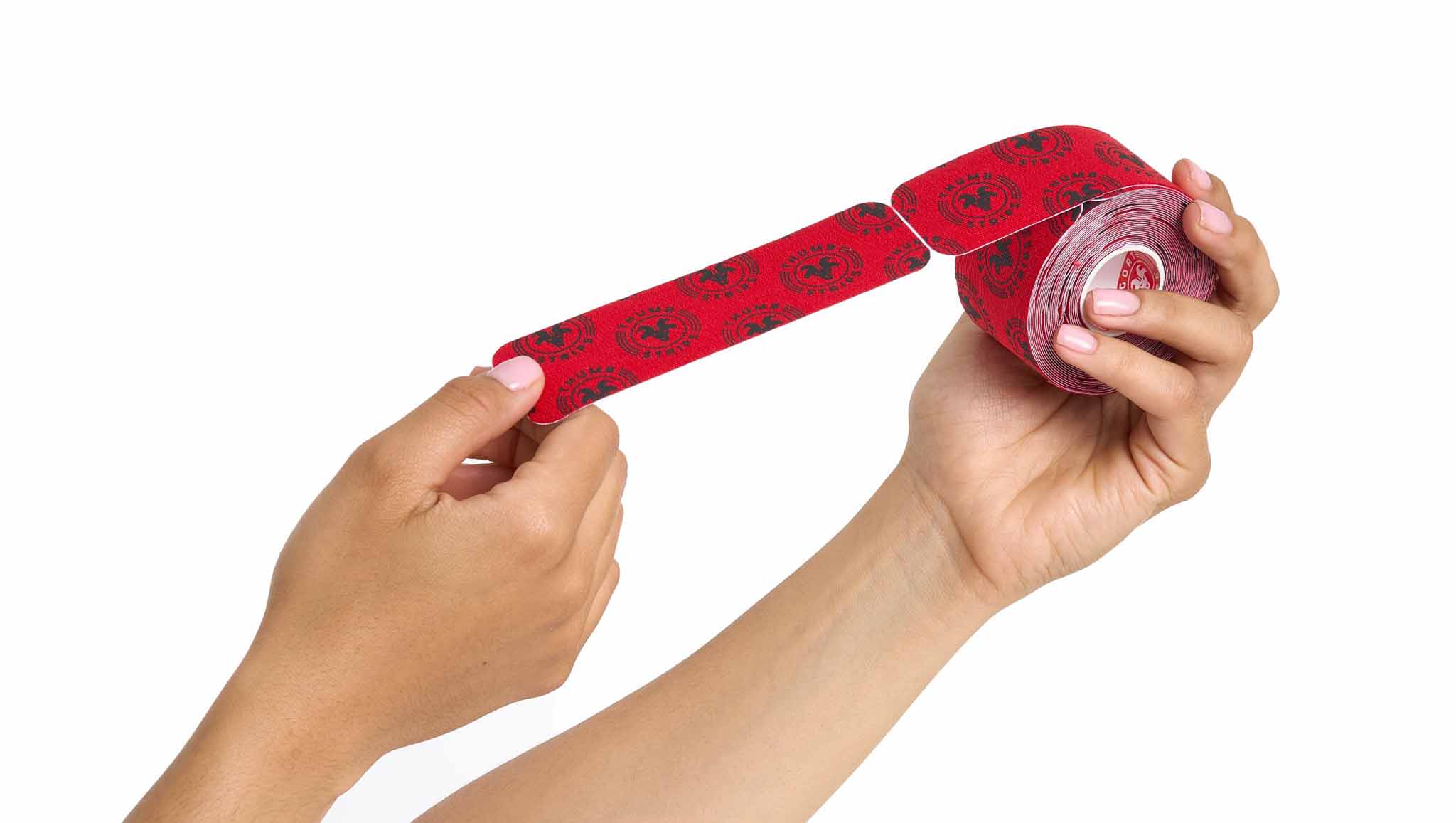 hands holding a red thumbs tape with black logo