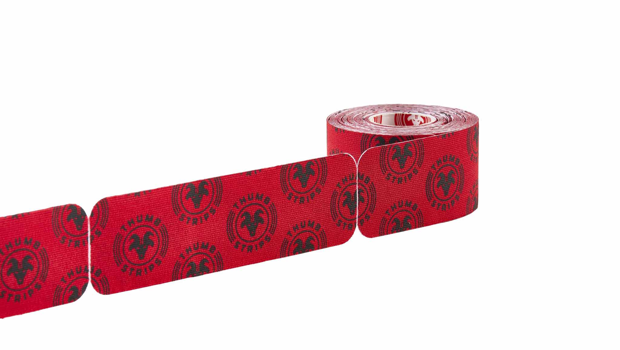 Red tape with black patterns on a white background